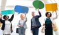 Successful business people with speech bubbles