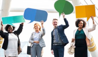 Successful business people with speech bubbles